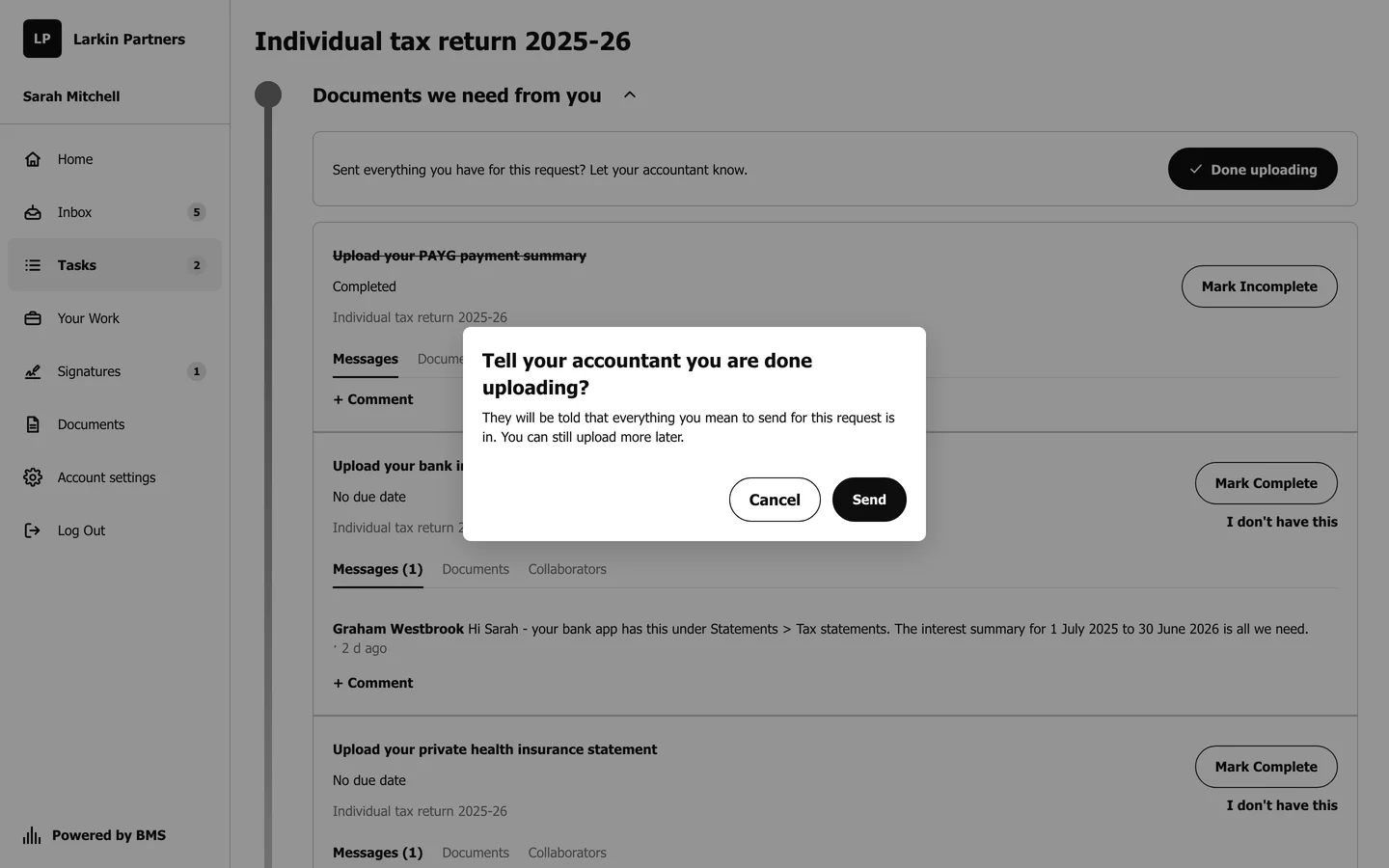 A confirmation dialog asking the client to tell Larkin Partners they are done uploading, with buttons to cancel or confirm.