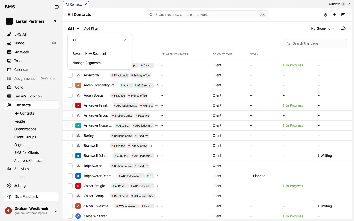 The Contacts view menu open with All, Save as New Segment and Manage Segments.