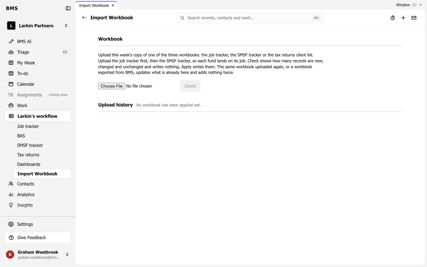The Import Workbook page with a Choose File control, a Check button and an Upload history section.